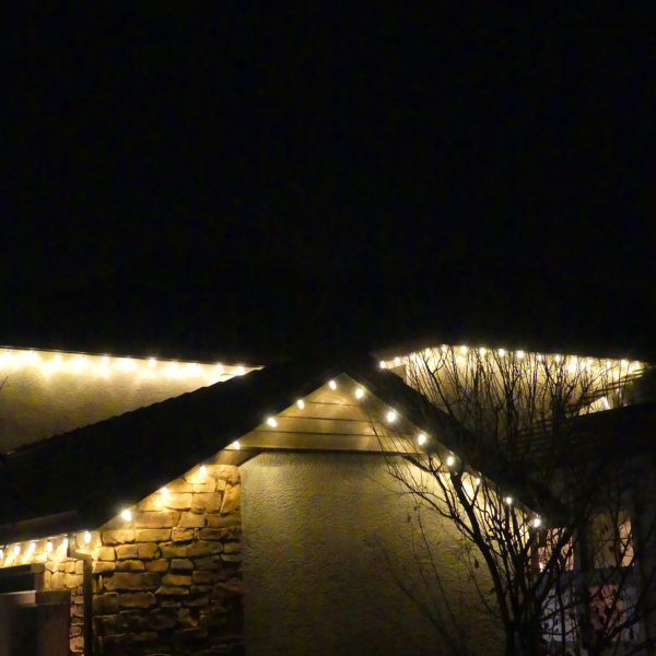 Warm white professional grade C9 Christmas lights on peaks and gutter lines